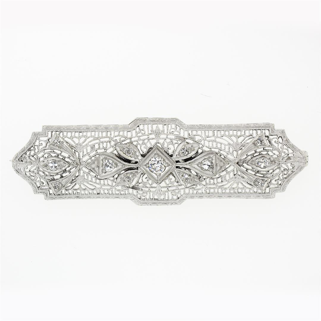 Antique Art Deco 14k White Gold 0.35 ctw Diamond Open Filigree Wide Bar Pin Broo: An antique art deco bar pin brooch, with 1 old european cut natural diamond (F/G - VS1 ; 0.10ct), 12 old single cut natural diamonds (F/G - VS1/VS2 ; 0.25ct). Measures 15.3x50.65mm and weighs a total 
