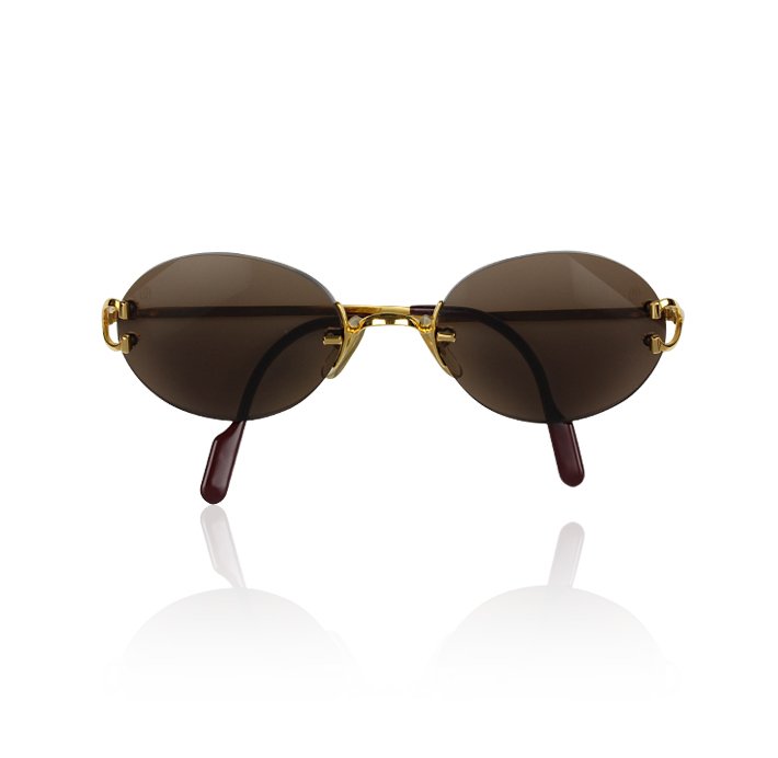 Vintage Cartier Gold Tone Sunglasses GB663: Vintage Cartier Gold Tone Sunglasses GB663. Good Condition! JU961DN. One vintage Cartier gold tone sunglasses. The sunglasses feature: chocolate colored lenses, gold tone hardware, burgundy colored te