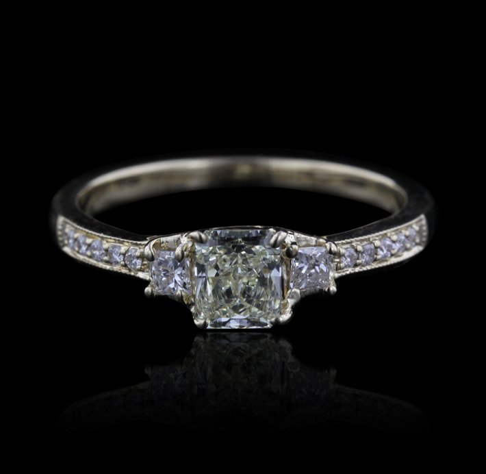 14KT Yellow Gold 0.69ctw Yellow and White Diamond Ring : 14KT Yellow Gold 0.69ctw Yellow and White Diamond Ring A4405. Good Condition! PT435TC. One electronically tested 14KT yellow gold ladies cast diamond unity ring. The featured diamond is accented by a 