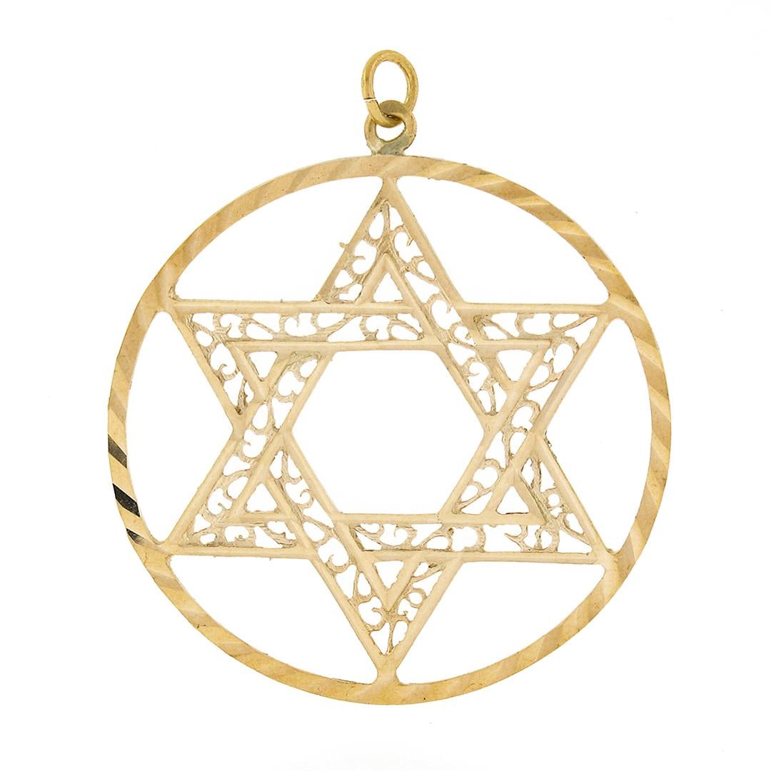 Vintage 14K Gold Large Open Star of David w/ Filigree Work Circle Charm Pendant: A vintage solid 14k yellow gold star of David charm pendant. The pendant weighs a total of 3.64 grams, measures 36.40mm in diameter including the bail, and the inside of the bail measures 3.30mm.