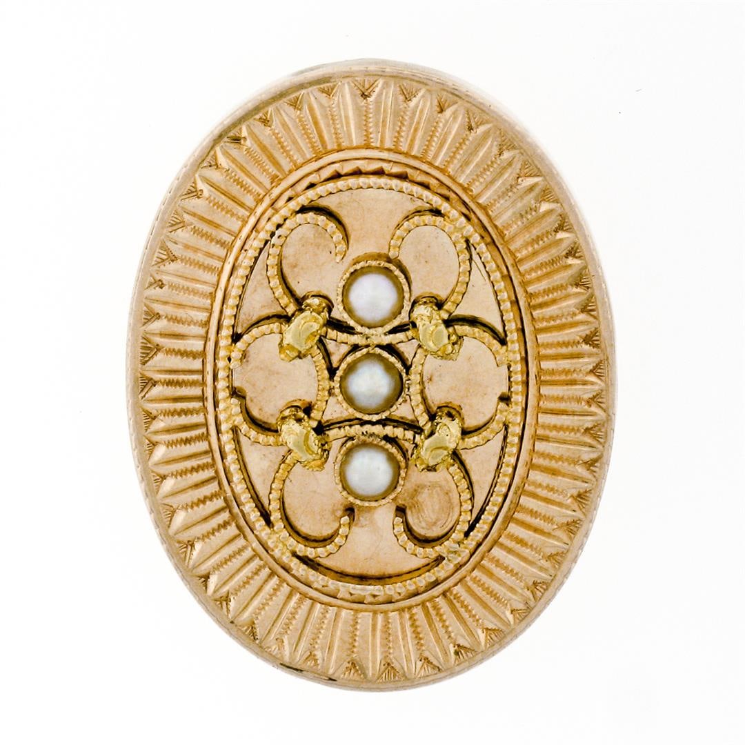 Antique 14K Yellow Gold Natural Pearl Hand Etched Detailed Twisted Wire Pendant: An antique solid 14k yellow gold pendant. with 3 round shape natural seed pearls (2.70mm). The pendant weighs a total of 4.65 grams, measures 27.60x21.30mm including the bail.