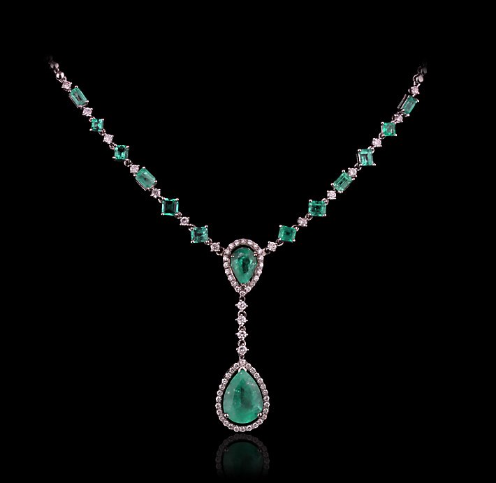 14KT White Gold 7.43ctw Emerald and Diamond Necklace FJ: 14KT White Gold 7.43ctw Emerald and Diamond Necklace FJM2150. Excellent Condition! CD9022GN. One electronically tested 14KT white gold ladies cast & assembled emerald and diamond necklace with a brigh