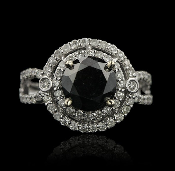 14KT White Gold 4.49ctw Black and White Diamond Ring RM: 14KT White Gold 4.49ctw Black and White Diamond Ring RM735. Excellent Condition! KI959DZ. One electronically tested 14KT white gold ladies cast black and white diamond ring with a bright polish finish