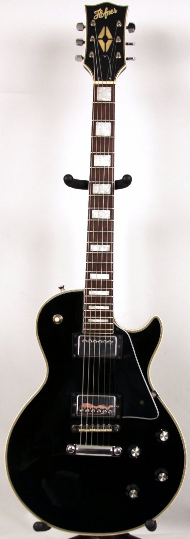 Hofner Les Paul Copy Guitar in Black DGUI50: Hofner Les Paul Copy Guitar in Black DGUI50. Great Condition! WY312DZ. A Hofner Les Paul Copy in black is not something we see every day. These guys back in the 60's and 70's were making tons of cool 