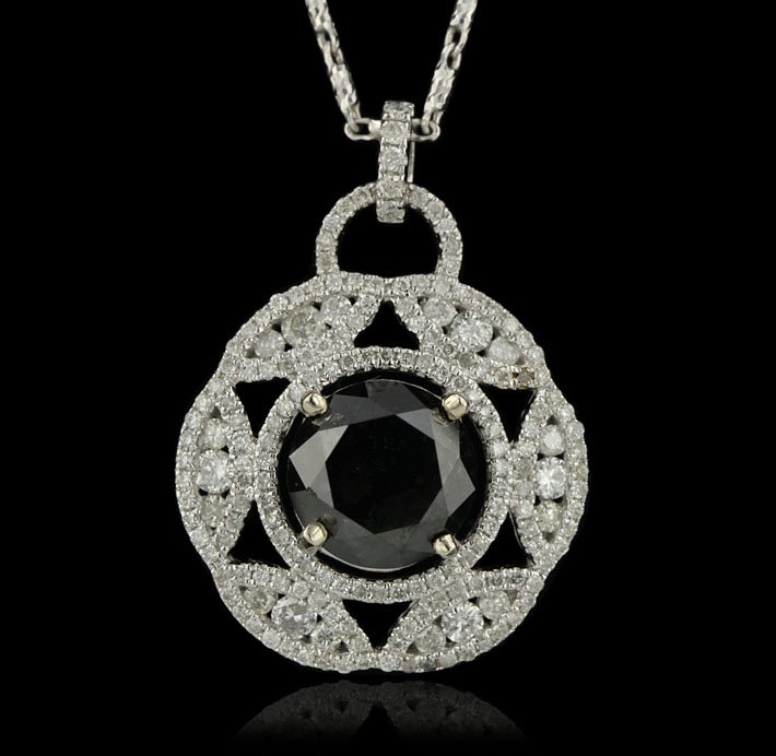 14KT White Gold 4.79ctw Black and White Diamond Pendant: 14KT White Gold 4.79ctw Black and White Diamond Pendant with Chain RM711. Excellent Condition! CN9431GT. One electronically tested 14KT yellow gold ladies cast & assembled aquamarine and diamond penda