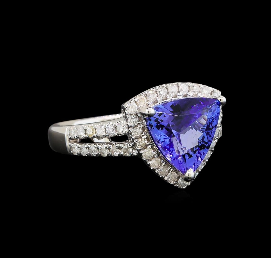 14KT White Gold 2.21 ctw Tanzanite and Diamond Ring: One electronically tested 14KT white gold ladies cast tanzanite and diamond ring with a split shank with a bright polish finish. Trademark is Orianne. Identified with markings of "14K". Condition is n