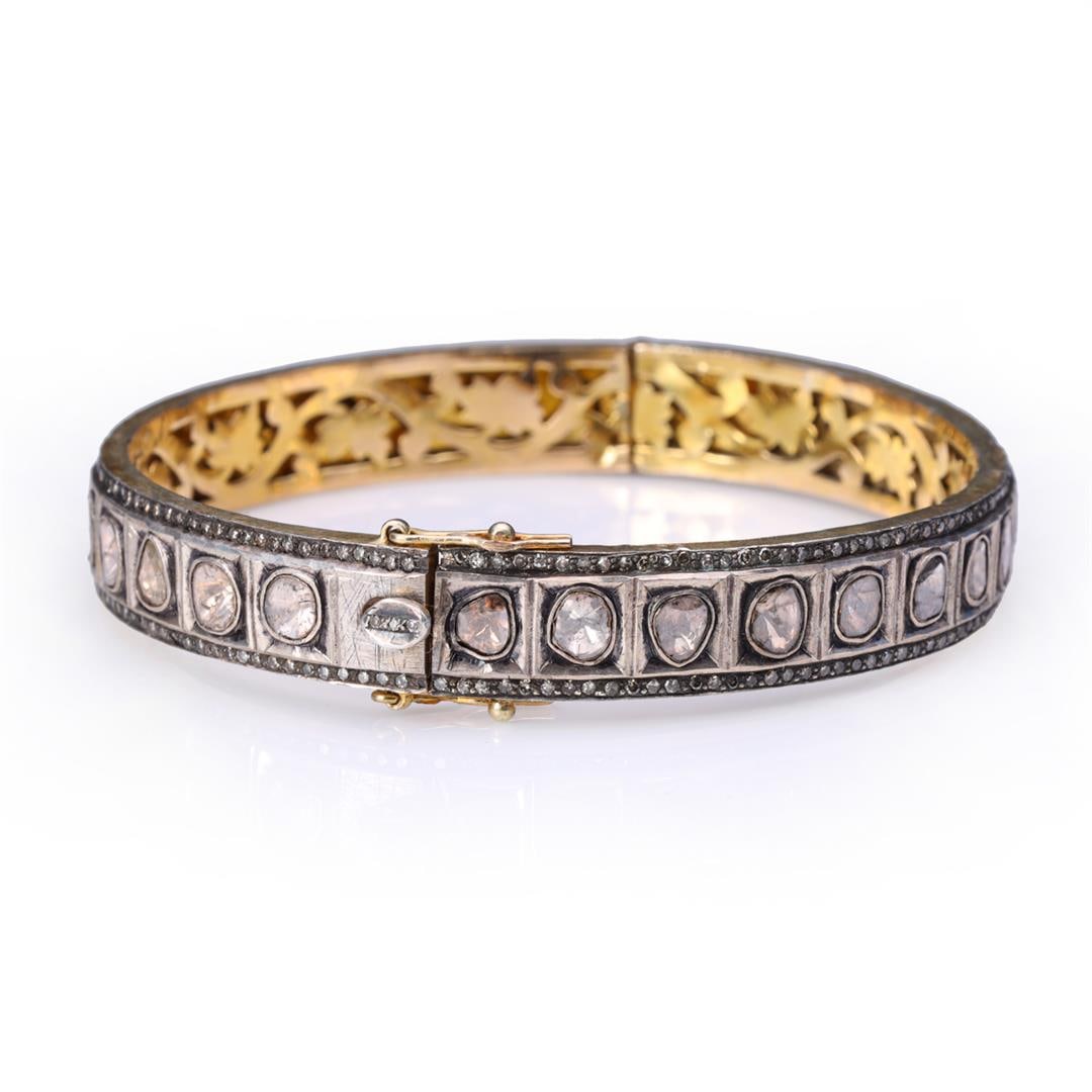 Vintage Indian Gold Topped Silver & Diamond Bangle: Vintage Indian Gold Topped Silver Polki & Diamond Slice Bangle. Total weight of 33.2 gm. Estimated retail value $800.