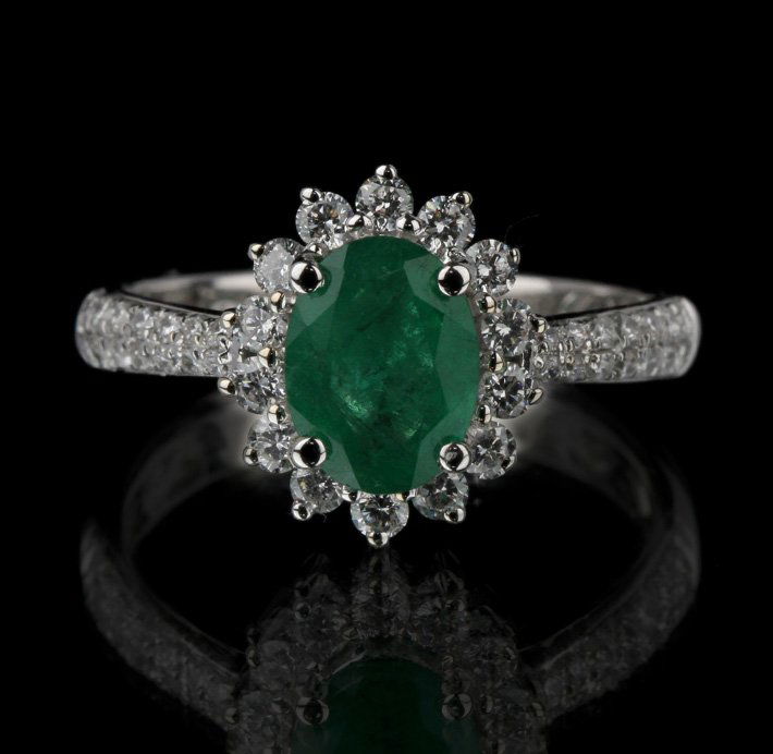 14KT White Gold 1.18ct Emerald and Diamond Ring FJM2277: 14KT White Gold 1.18ct Emerald and Diamond Ring FJM2277. Excellent Condition! YL996BG. One ring featuring: 2.83gm of 14KT white gold, (1) emerald with a total weight of 1.18cts and (42) round cut diam