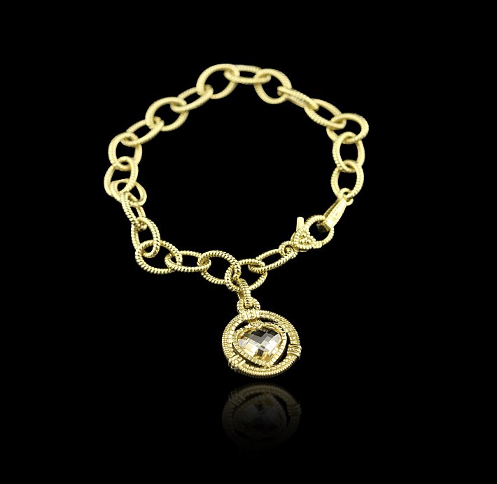 Judith Ripka 18KT Yellow Gold Crystal Heart Bracelet GB: Judith Ripka 18KT Yellow Gold Crystal Heart Bracelet GB308. Good Condition! RJ2031GW. One electronically tested 18KT yellow gold ladies cast & assembled crystal and diamond bracelet with a bright and