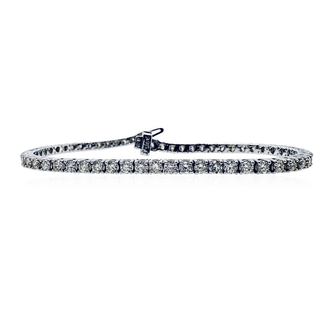4.46 ctw Diamond Tennis Bracelet - 14KT White Gold: One electronically tested 14KT white gold lady's combination cast & assembled fashion straight line tennis bracelet with a tongue clasp with fold-under safety with a basket motif with a bright polish 