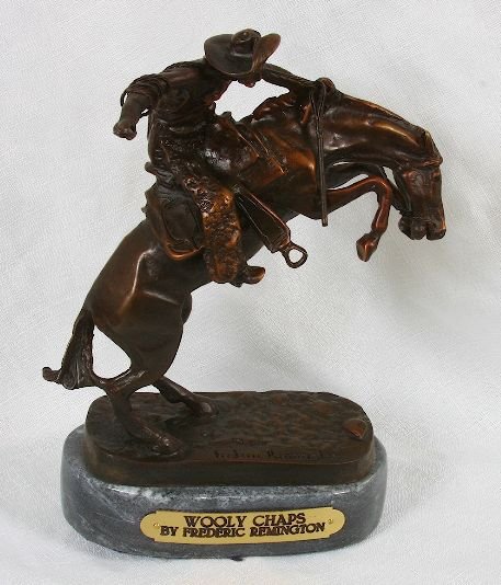 Frederic Remington Bronze Statue Reproduction - Wooly C: Frederic Remington Bronze Statue Reproduction - Wooly Chaps - As-Is Condition JK57RT - Thank you for viewing this lot. We are always adding new inventory and new auctions, so check back often. We appr