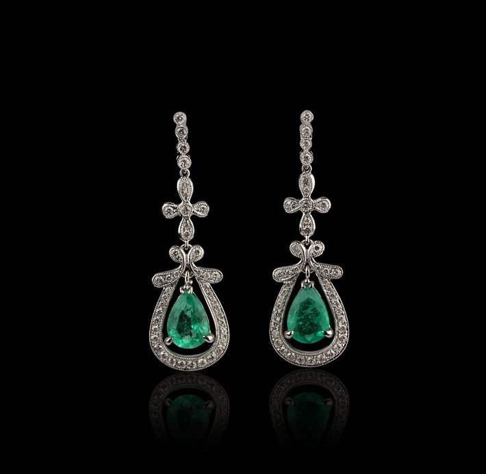 14KT White Gold 3.30ctw Emerald and Diamond Earrings FJ: 14KT White Gold 3.30ctw Emerald and Diamond Earrings FJM2139. Excellent Condition! SJ9282NQ. One pair of earrings featuring: 6.70gm of 14KT white gold, (2) emeralds with a total weight of 3.30cts and 