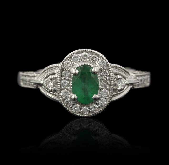 14KT White Gold 0.42ct Emerald and Diamond Ring FJM2260: 14KT White Gold 0.42ct Emerald and Diamond Ring FJM2260. Excellent Condition! SK904YU. One ring featuring: 4.01gm of 14KT white gold, (1) emerald with a total weight of 0.42cts and (70) round cut diam