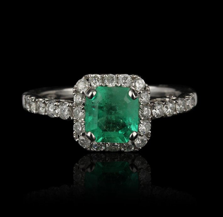 14KT White Gold 0.97ct Emerald and Diamond Ring FJM2059: 14KT White Gold 0.97ct Emerald and Diamond Ring FJM2059. Excellent Condition! YM906NX. One ring featuring: 2.68 grams of 14KT white gold, (1) 0.97ct emerald and (32) round cut diamonds with a total we