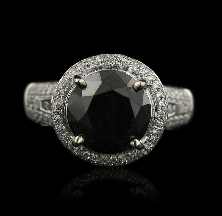 14KT White Gold 5.30ctw Black and White Diamond Unity R: 14KT White Gold 5.30ctw Black and White Diamond Unity Ring RM745. Excellent Condition! JV9521HI. One electronically tested 14KT white gold ladies cast diamond unity ring with a bright polish finish. C