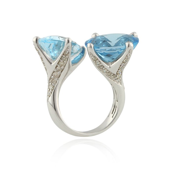 14KT White Gold 17.21ctw Blue Topaz and Diamond Ring FJ: 14KT White Gold 17.21ctw Blue Topaz and Diamond Ring FJM1965. Excellent Condition! DD186VS. One ring containing: 8.72 grams of 14KT White Gold, (2) Blue Topaz weighing 17.21cts, (46) Round cut Diamond