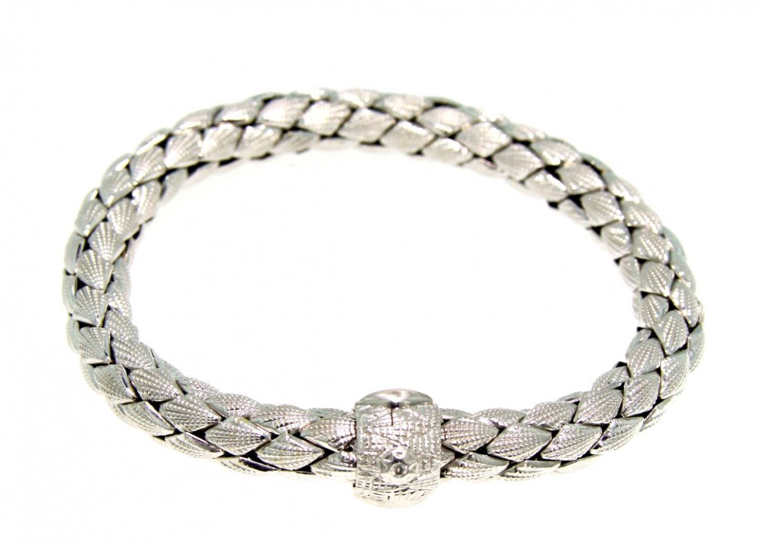 18KT White Gold Estate Ladies Chimento Bracelet GD400: 18KT White Gold Estate Ladies Chimento Bracelet GD400. Excellent Condition! OJ8391FT. One ladies 18KT white gold Estate Chimento Rope Link bracelet. Measures 8 in length. Weighs 35.7gm. Marked "Chimen