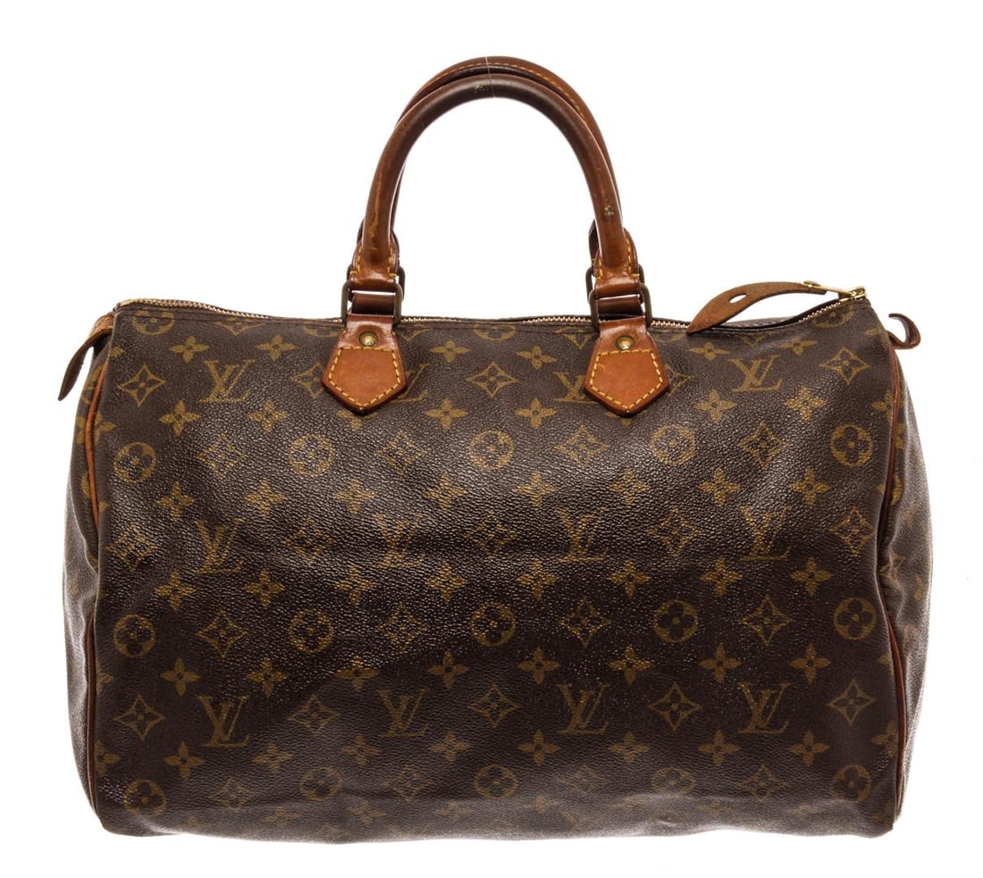 Louis Vuitton Brown Monogram Canvas Speedy 35 Satchel Bag: Louis Vuitton Brown Monogram Canvas Speedy 35 Satchel Bag. All available information is listed in the description and shown in the photos. Louis Vuitton Brown Monogram Canvas Speedy 35 Satchel Bag wit