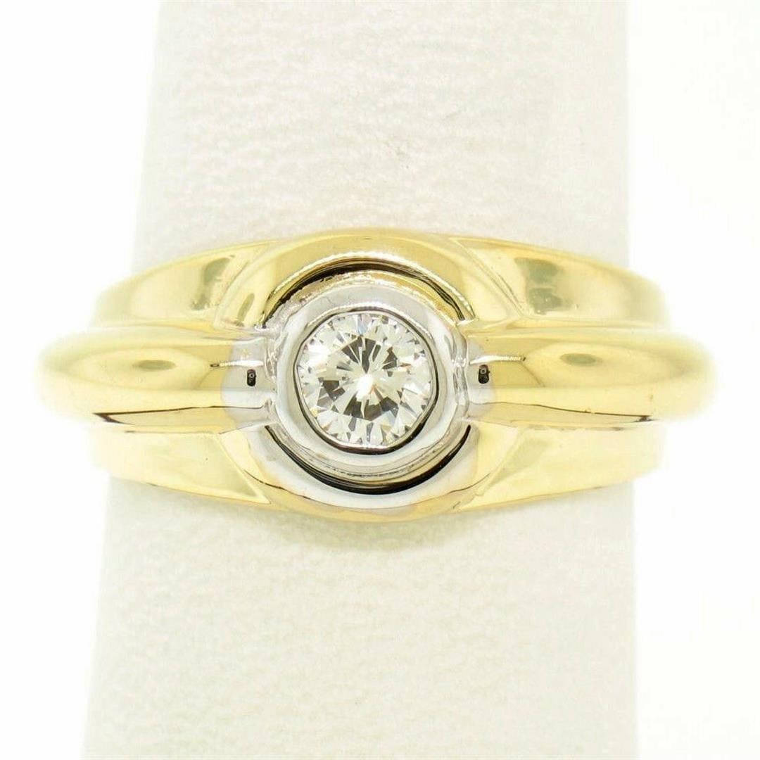 Men's 14k Yellow and White Gold 0.40 ctw Bezel Round Diamond Solitaire Band Ring: A like new men's 14k yellow gold band ring bezel set with a 0.40ct round diamond (F - SI1). The ring is size 7, weighs a total of 6.4 grams, and measures 9.55mm wide.