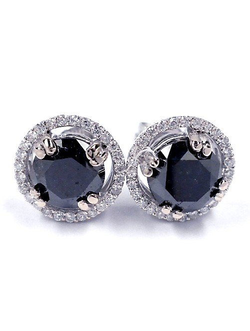 14KT White Gold 3.3ct Black and White Diamond Stud Earr: 14KT White Gold 3.3ct Black and White Diamond Stud Earrings J44. New Condition! WZ547YE. One pair electronically tested 14KT white gold cast and assembled black and white diamond earrings with standar