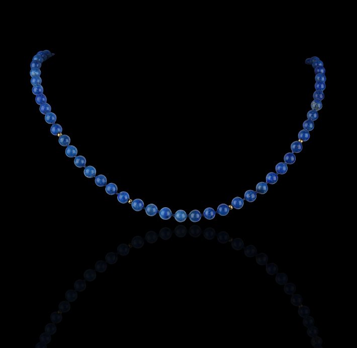 14KT Yellow Gold and Blue Lapiz Bead Strand Necklace FJ: 14KT Yellow Gold and Blue Lapiz Bead Strand Necklace FJM2122. Excellent Condition! RZ952LD. One necklace featuring: 14KT yellow gold beads and (65) blue lapiz beads. Thank you for viewing this lot! We