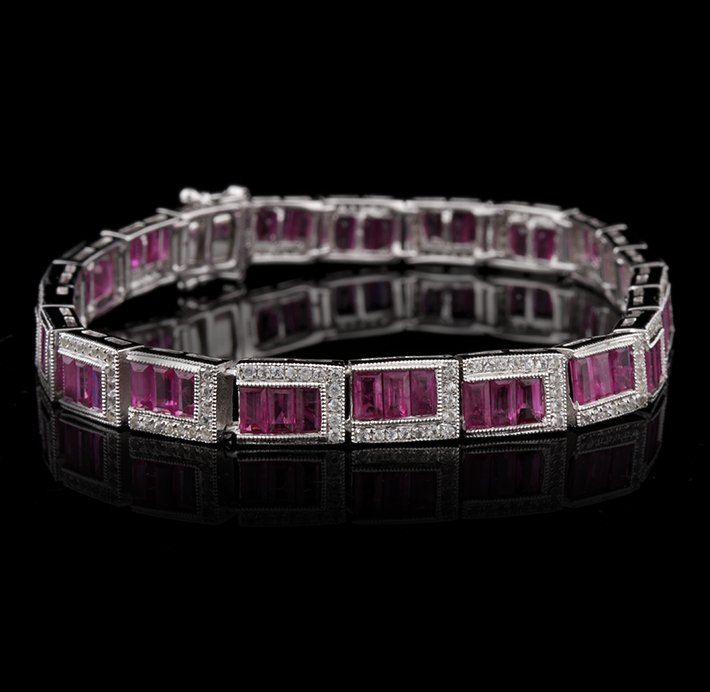 SILVER 10.95ctw Ruby and White Sapphire Bracelet SLV51: SILVER 10.95ctw Ruby and White Sapphire Bracelet SLV51. Excellent Condition! CP914XD. One bracelet featuring: 14.50gm of sterling silver, (66) rubies with a total weight of 10.95cts and (242) white sa