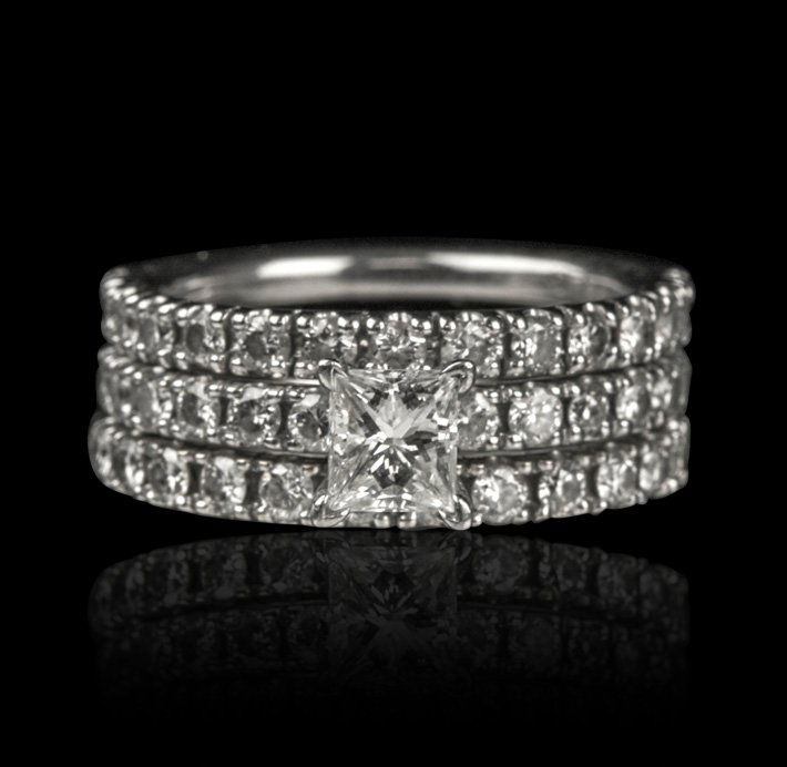 14KT White Gold 1.99tcw Diamond Ring A3944: 14KT White Gold 1.99tcw Diamond Ring A3944. Excellent Condition! YG6721NE. One ladies' diamond wedding ring set. The set is stamped and tested 14KT white gold and contains 1 princess cut center diamon
