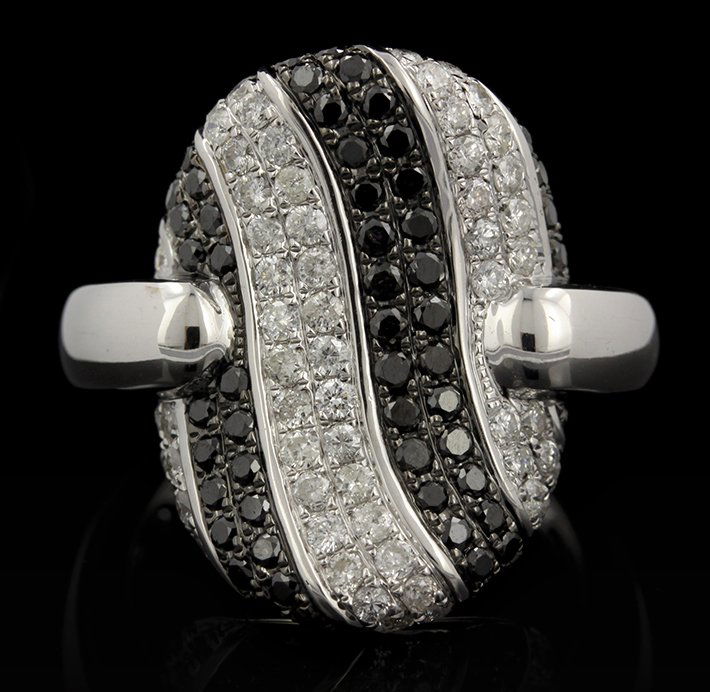 18KT White Gold 1.49ctw Black and White Diamond Ring FJ: 18KT White Gold 1.49ctw Black and White Diamond Ring FJM2322. Excellent Condition! YB9721SO. One ring featuring: 12.88gm of 18KT white gold, (58) black diamonds with a total weight of 0.67cts and (58)