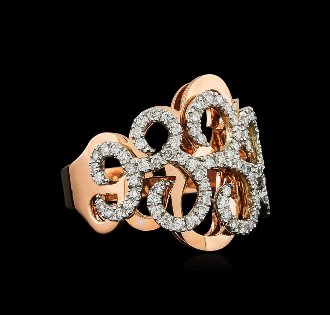 14KT Rose Gold 0.62 ctw Diamond Ring: One electronically tested 14KT rose gold ladies combination cast & assembled ring with a bright polish finish. Identified with markings of "14K". Condition is new. Containing: Seventy-Eight prong set 