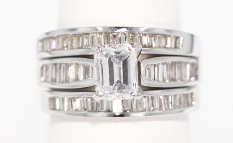 14KT White Gold 2.01ctw Diamond Wedding Ring Set A3294: 14KT White Gold Ladies Diamond Wedding Set A3294. Good Condition! XT1052KD One electronically tested 14KT white gold ladies cast and assembled diamond wedding set. The Wedding set is composed of an en