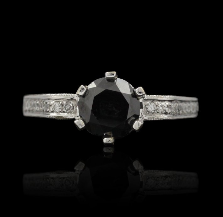 14KT White Gold 2.02ctw Black and White Diamond Ring RM: 14KT White Gold 2.02ctw Black and White Diamond Ring RM864. Excellent Condition! NE946RC. One lady’s polished, stamped and electronically tested solid 14K white gold ring mounted with: 1 Genuine Rou