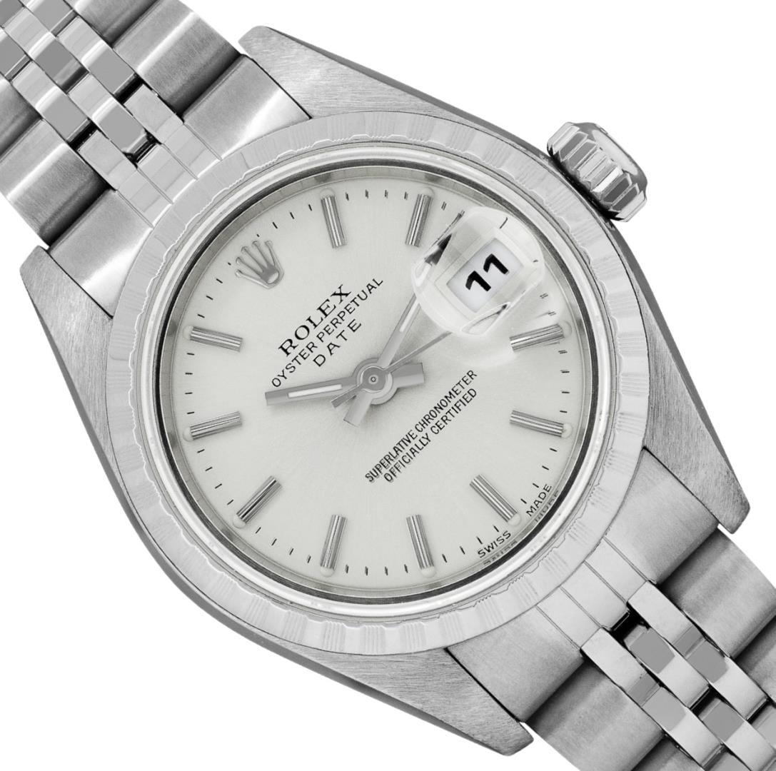Rolex Ladies Stainless Steel Silver Index Dial Engine Turn Bezel Jubilee Band Da: One Rolex Ladies Pre Owned Quickset Stainless Steel Date Wristwatch Polished Bright with Satin Finish, Serviced And Electronically Tested, Stainless Steel Case: 26mm, Stainless Steel Crown, Rolex Stai