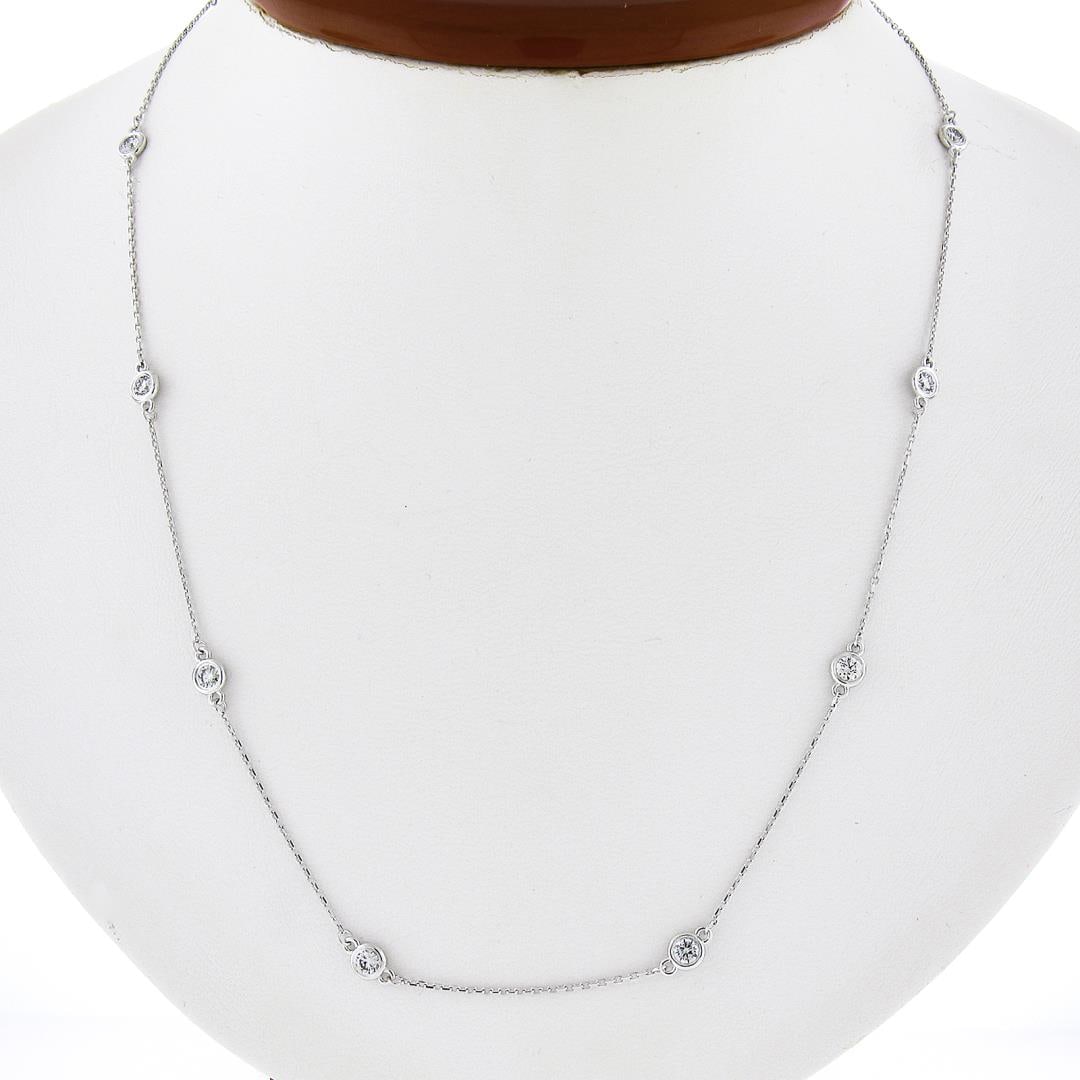 NEW 14K White Gold 1.0 ctw Bezel Station Round Diamond by the Yard Chain Necklac: A new solid 14k white gold by the yard necklace. with 10 round brilliant cut natural diamonds (F/G - VS1/VS2 ; 1.0ctw). It weighs a total of 2.10 grams, measures 4.4mm wide, and measures 18 inches in 