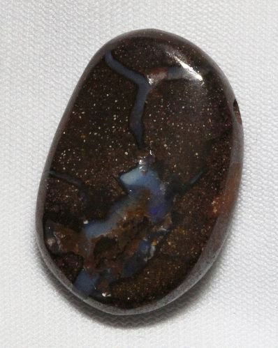 Boulder Opal (42.88ct.) BO76: Boulder Opal (42.88ct.) BO76. Excellent Condition! ZP4YL. One Boulder Opal weighing 42.88ctw. Thank you for viewing this lot. We are always adding new inventory and new auctions, so check back often.