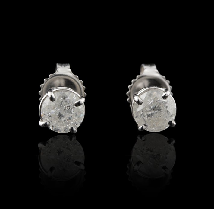 14KT White Gold 1.62ctw Diamond Solitaire Earrings GB1: 14KT White Gold 1.62ctw Diamond Solitaire Earrings GB1179. Good Condition! VY794BU. One electronically tested 14KT white gold cast & assembled diamond solitaire earrings with standard becks. Condition
