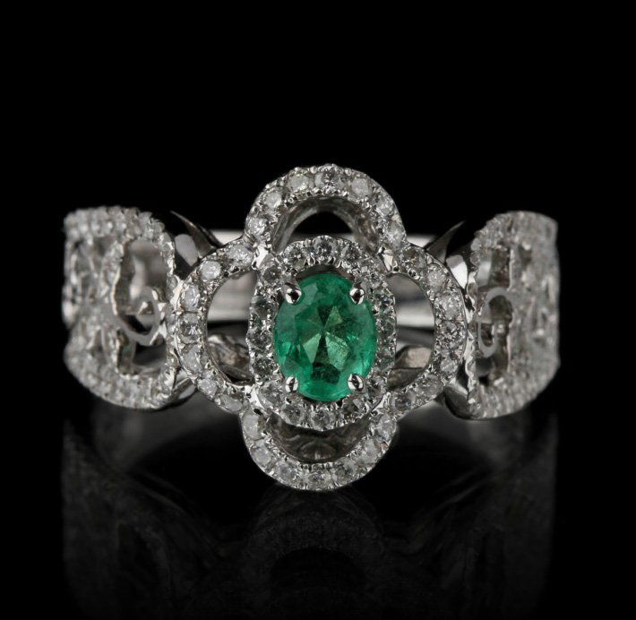18KT White Gold 0.32ct Emerald and Diamond Ring FJM2276: 18KT White Gold 0.32ct Emerald and Diamond Ring FJM2276. Excellent Condition! YN936OC. One ring featuring: 5.16gm of 18KT white gold, (1) emerald with a total weight of 0.32cts and (92) round cut diam