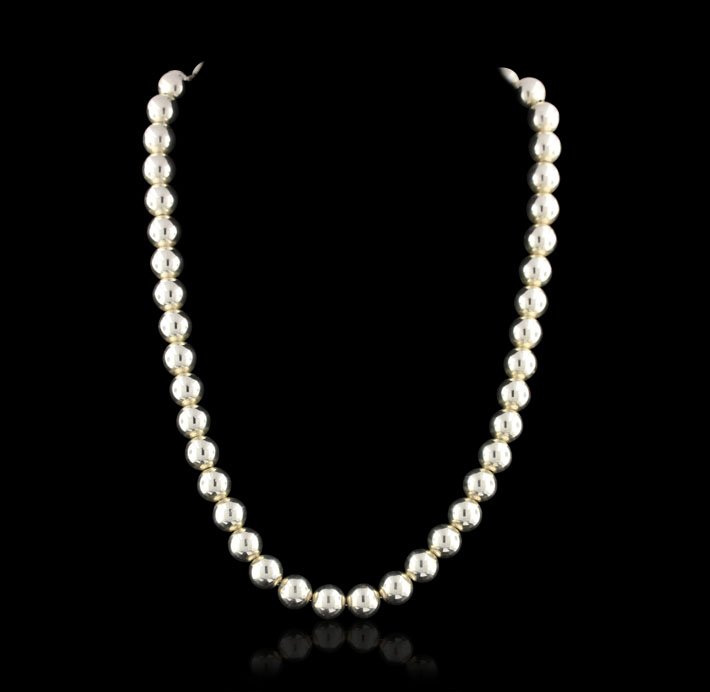 Tiffany & Co. Sterling Silver 10mm Ball Necklace GD427: Tiffany & Co. Sterling Silver 10mm Ball Necklace GD427. Great Condition! CD951OL. One new Tiffany and Co. necklace featuring: 47.2 grams of sterling silver, 10mm balls and Approximately 17.5 inches lo