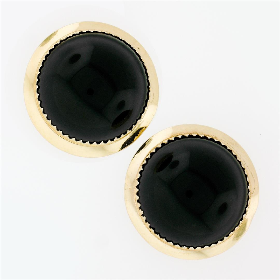 Vintage 14K Yellow Gold Round Cabochon Black Onyx Button Earrings w/ Plain Frame: A vintage solid 14k yellow gold button earrings, with 2 round cabochon cut natural black onyx (7.40mm). The earrings measure approximately 9.15mm in diameter and weigh a total of 6.44 grams.