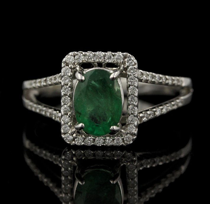 18KT White Gold 0.92ct Emerald and Diamond Ring FJM2263: 18KT White Gold 0.92ct Emerald and Diamond Ring FJM2263. Excellent Condition! PE993US. One ring featuring: 3.35gm of 18KT white gold, (1) emerald with a total weight of 0.92cts and (60) round cut diam