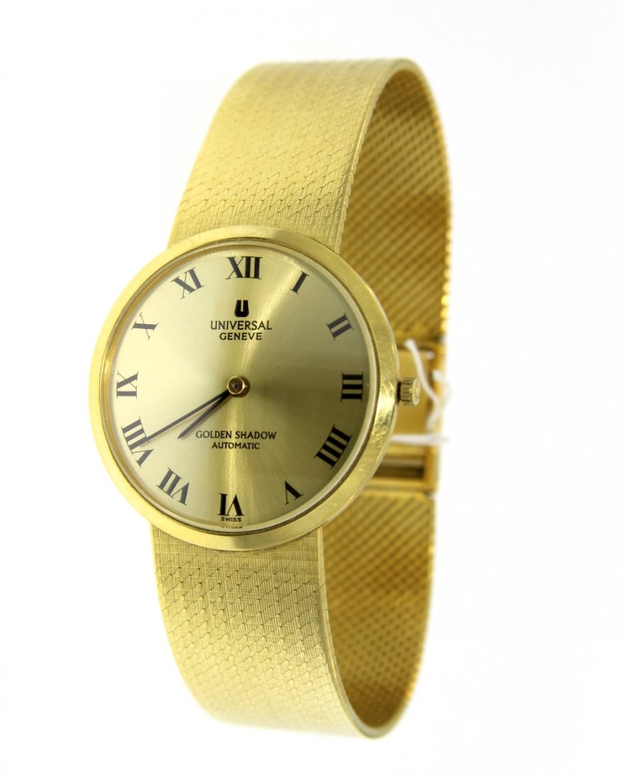 Universal Geneve Golden Shadow 18KT Yellow Gold Watch G: Universal Geneve Golden Shadow 18KT Yellow Gold Watch GB1153. Great Condition! YD9033EY. One Universal Geneve Golden Shadow 18KT yellow gold wristwatch. More than 150 precision parts, 25 jewels, shock