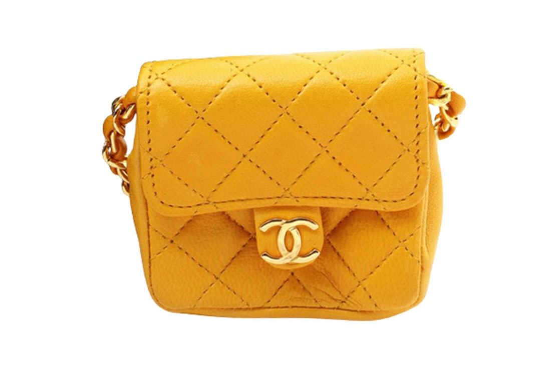 Chanel Yellow Quilted Leather Flap Micro Flap Bag: One Chanel Yellow Quilted Leather Flap Micro Flap Bag. Item is sold AS-IS. All available information is listed in the description and shown in the photo. Yellow quilted leather Chanel Micro Flap bag w