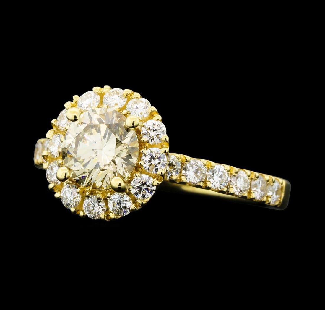 1.66 ctw Diamond Ring - 14KT Yellow Gold: One electronically tested 14KT yellow gold lady's cast wedding ring with a cathedral halo with a bright polish finish. The featured lady's ring has a shank measuring 1.80 millimeters wide. Identified