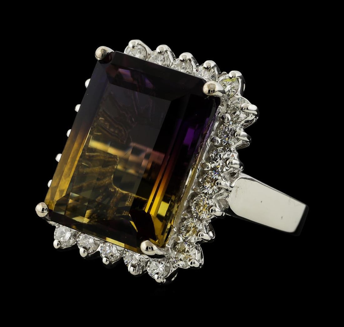 12.15 ctw Ametrine Quartz and Diamond Ring - 14KT White Gold: One electronically tested 14KT white gold lady's cast fashion ring with a cathedral shank with a basket halo with a bright polish finish. The featured lady's ring has a shank measuring 2.75 millimeter