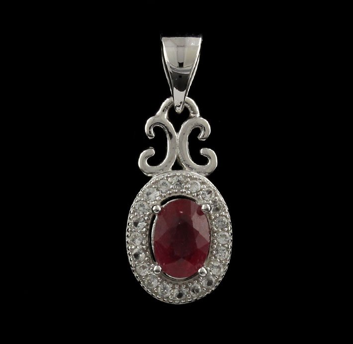SILVER Ruby and White Sapphire Pendant SLV45: SILVER Ruby and White Sapphire Pendant SLV45. Excellent Condition! WJ91MN. One pendant featuring: 1.00gm of sterling silver, (1) ruby and white sapphires. Thank you for viewing this lot! We are always