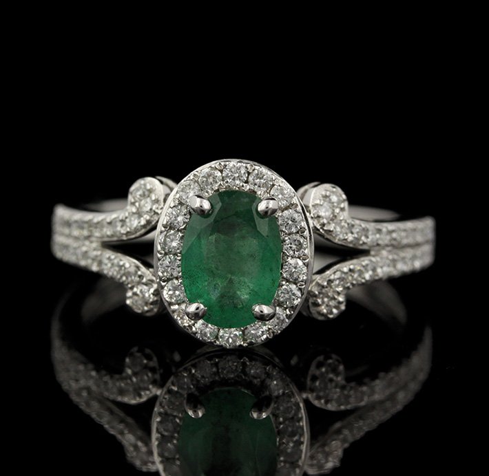 14KT White Gold 0.69ct Emerald and Diamond Ring FJM2262: 14KT White Gold 0.69ct Emerald and Diamond Ring FJM2262. Excellent Condition! ES985YD. One ring featuring: 2.55gm of 14KT white gold, (1) emerald with a total weight of 0.69cts and (62) round cut diam