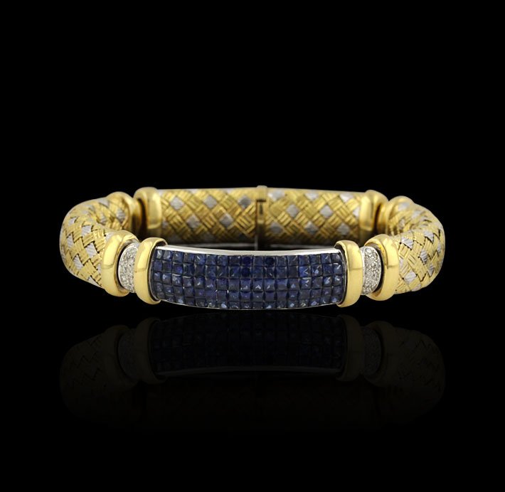 18KT Yellow & White Gold 6.50 ctw Sapphire & 0.30ctw Di: 18KT Two-Tone, Yellow & White Gold 6.50 ctw Sapphire & 0.30ctw Diamond Bracelet A4620. Good Condition! GL8482UL. One electronically tested 18KT two-tone, yellow and white gold ladies cast & assembled 