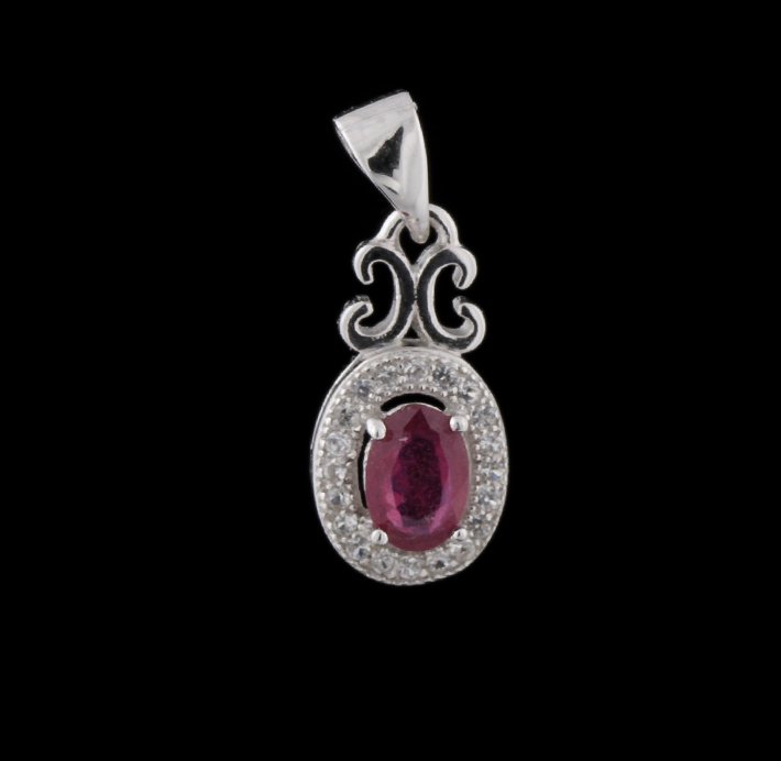 SILVER Ruby and White Sapphire Pendant SLV71: SILVER Ruby and White Sapphire Pendant SLV71. Excellent Condition! IT91YD. One pendant featuring: 1.00gm of sterling silver, (1) ruby and white sapphires. Thank you for viewing this lot! We are always