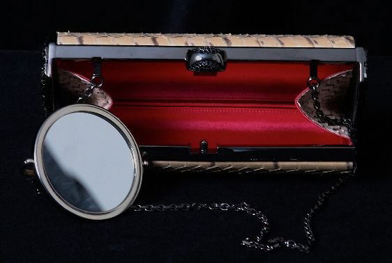 New Judith Leiber Minaudiere Bag ED423: New Judith Leiber Minaudiere Bag. ED423. Excellent Condition! FD564HY. JUDITH LEIBER minaudiere (French for little treasure) handbag covered in pale dusty rose and slate gray genuine snakeskin featu