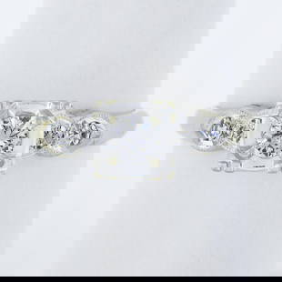 Vintage 14k White Gold 0.35 ctw Round Brilliant Diamond Solitaire Engagement Rin: A vintage solid 14k white gold engagement ring, with 1 round cut natural diamond (F - VS1 ; 0.23ct), accented with 4 old single cut natural diamonds (E/F - VS1/VS2 ; 0.12ctw). The ring is size 8.0, we