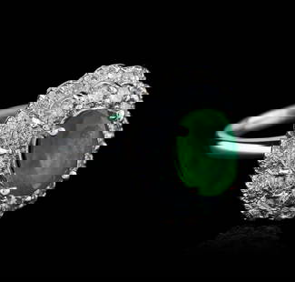 14KT White Gold 2.23 ctw Emerald and Diamond Ring: One electronically tested 14KT white gold ladies cast emerald and diamond ring with a cathedral shank with a bright polish finish. Identified with markings of "K14". Condition is new. Containing: One
